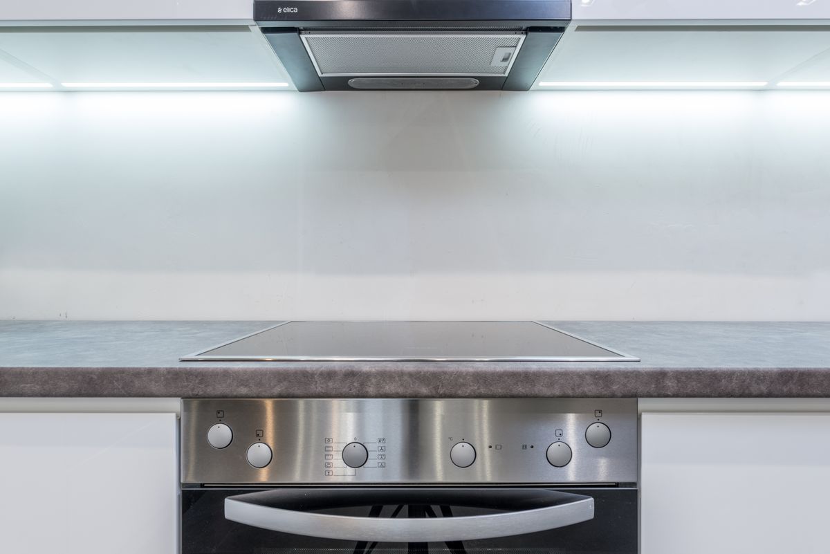 Beautifully finished appliance remodel with custom cabinetry
